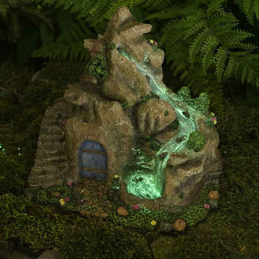 Woodland Knoll Glowing Waterfall shown at night