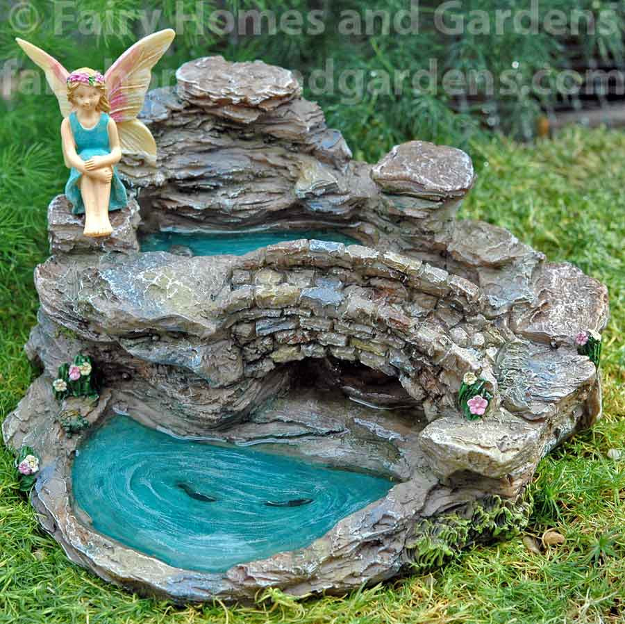 Woodland Knoll Waterfall Bridge Shown with Fairy 