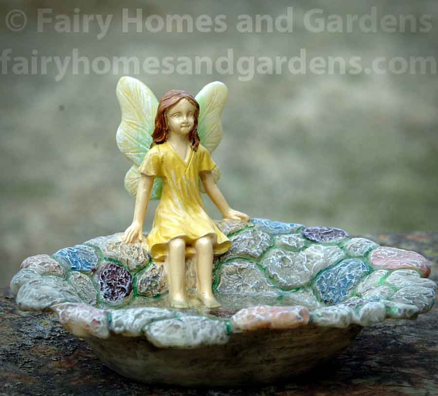 Woodland Knoll Fairy Cooling Off with Her Toes in the Water