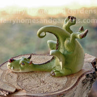 Miniature Green Dragon with Tiny Ladybug