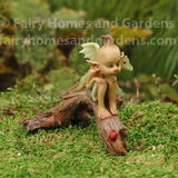 Pixie with Baby Dragon on Branch (front view)