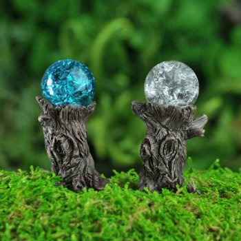 miniature-crackled-glass-gazing-balls-on-woodland-stumps.jpg