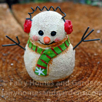 miniature-snowman-with-earmuffs.jpg